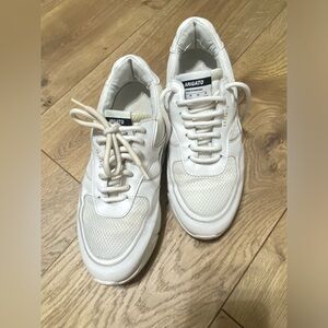 Axel arigato dad sneakers, like golden goose but lower key.